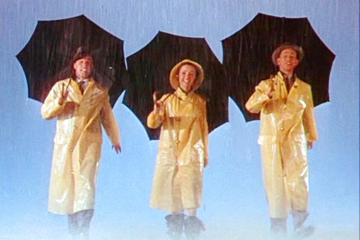 Кадр из фильма "Поющие под дождем" Кадр из фильма "Поющие под дождем"