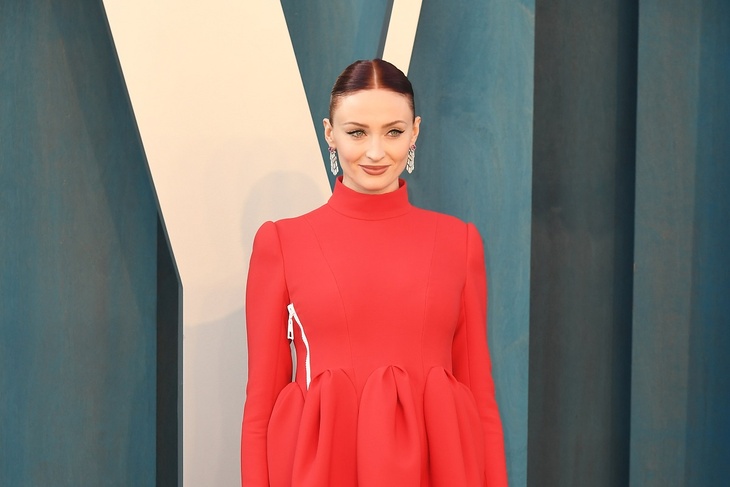 Sophie Turner in red gown shows off baby bump 