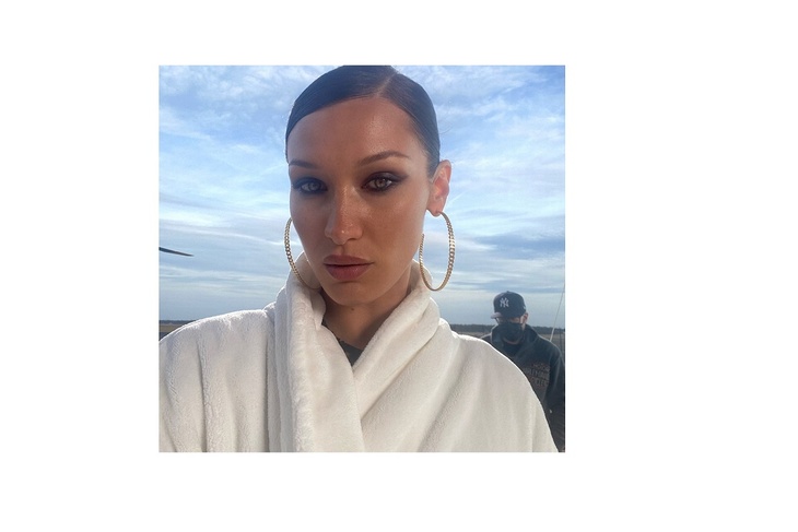 Bella Hadid catches the eye in a kooky fur-look Louis Vuitton hat