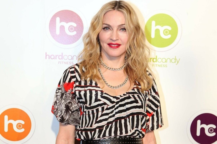 Photo: Madonna flaunts her backside in thong and fishnet tights