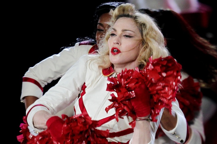 Madonna, clutching her crotch, said that she helps her in difficult moments