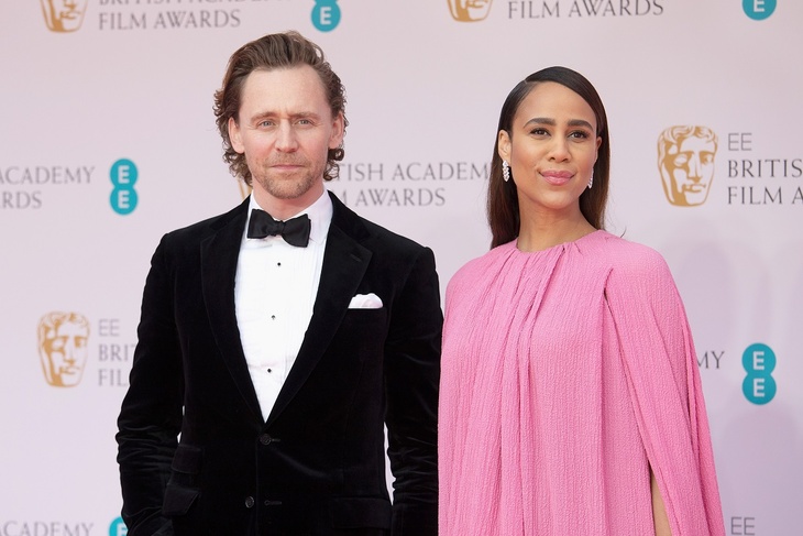 Tom Hiddleston could not restrain himself and stroked his fiancee Zawe Ashton in public