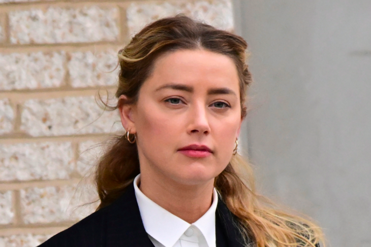 Amber Heard cries during the testimony of a witness about Elon Musk
