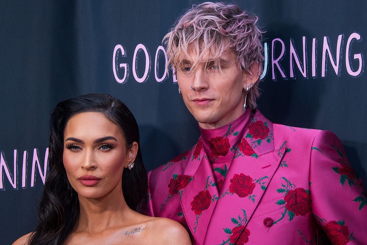 PHOTO: Megan Fox flashes curves in a corset gown while Machine Gun Kelly rocks suit with roses