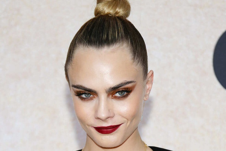 PHOTO: Cara Delevingne looks racy with endless legs and ample cleavage at the amfAR Gala Cannes