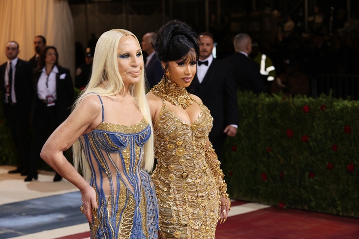 PHOTO: Cardi B and Donatella Versace shine in matching gold gowns on the Met Gala 2022