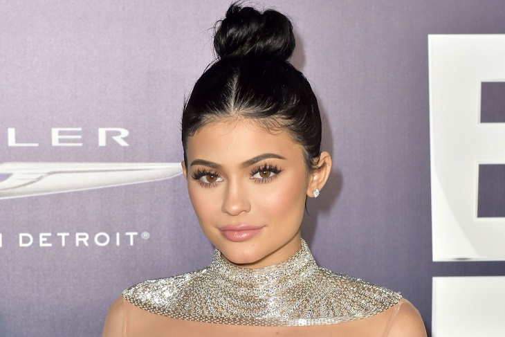 VIDEO: Kylie Jenner showcases her curves in a silver swimsuit as she enjoys vacation