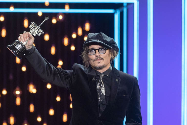 Johnny Depp had to be assisted out of a hotel in Birmingham… and here’s why