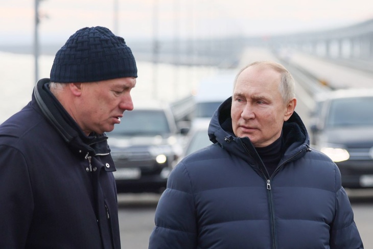 Путин проехал за рулем автомобиля по отремонтированному Крымскому мосту