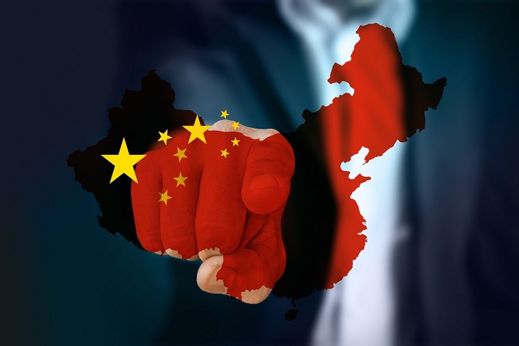 Политолог считает, что Китай стремится показать себя всемирным арбитром