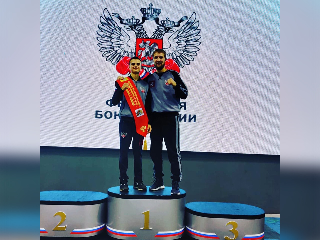 С тренером, после победы на первенстве России среди юниоров